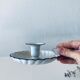 Antique candle holder in white and blue enamelled metal