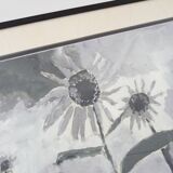 Framed painting with gray flower decor.