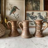 Trio of stoneware candle holders