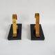 Pair of vintage Art Deco style bookends in marble and gold-plated metal