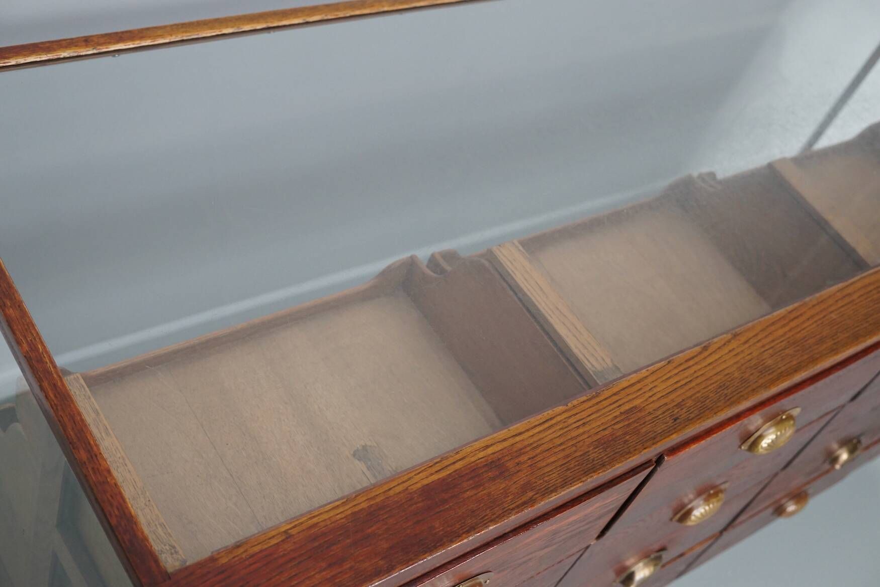 Antique English oak and glass counter/display cabinet, circa 1920-1930