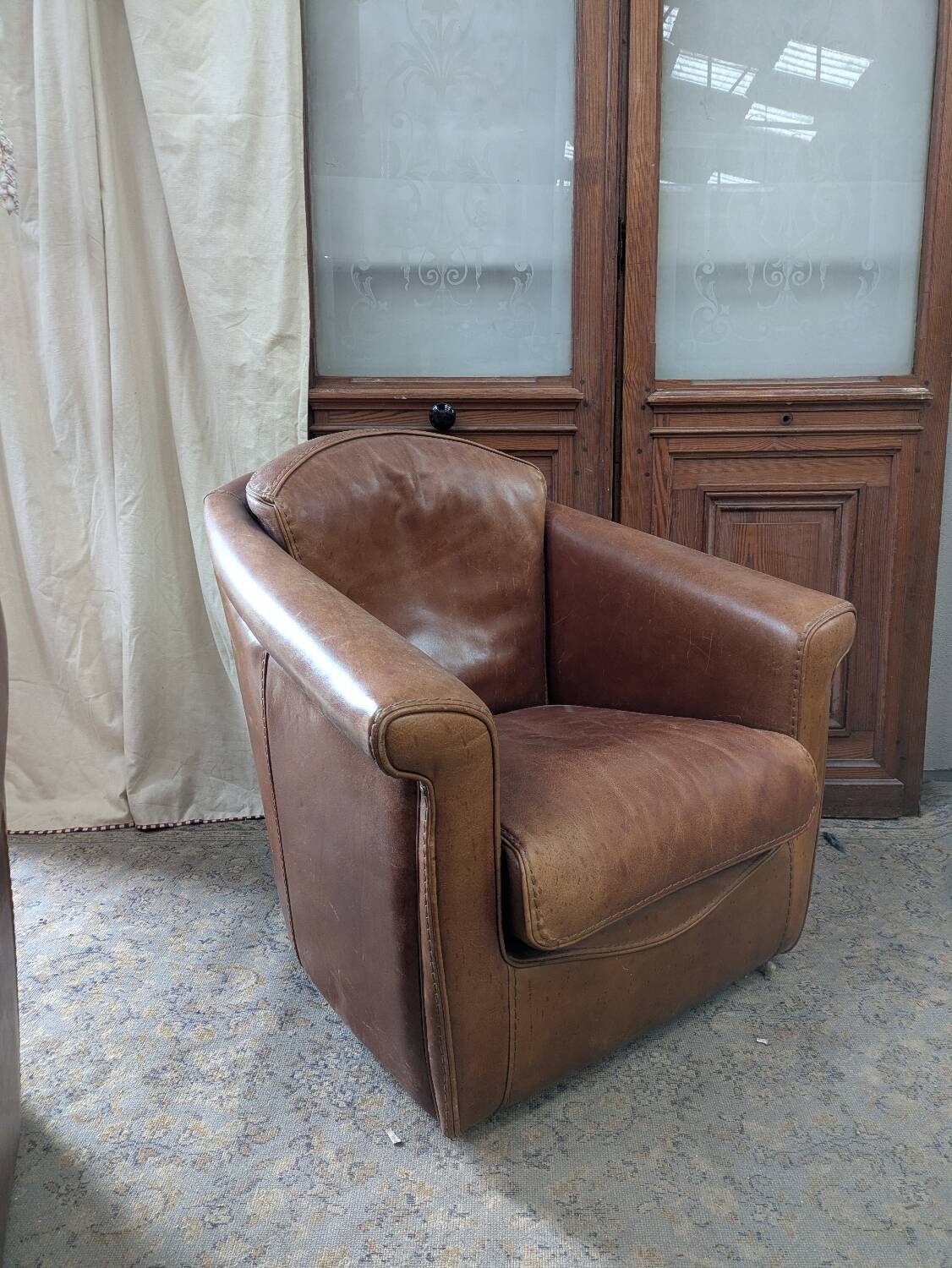 Pair of leather armchairs