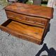 Curved commode in Louis XV style made of cherry wood.