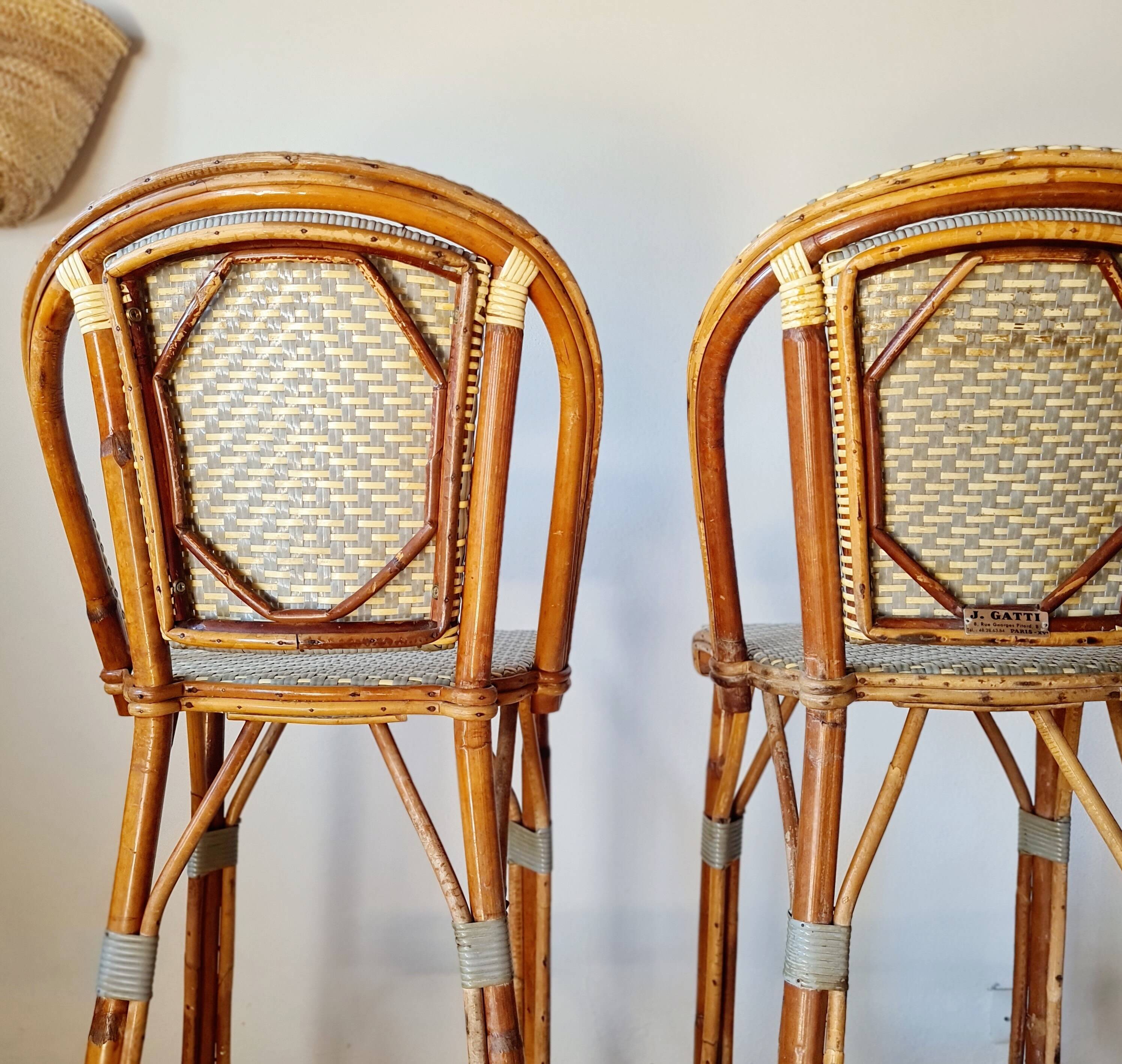 Vintage Gaty bar stools in two-tone rattan and caning.
