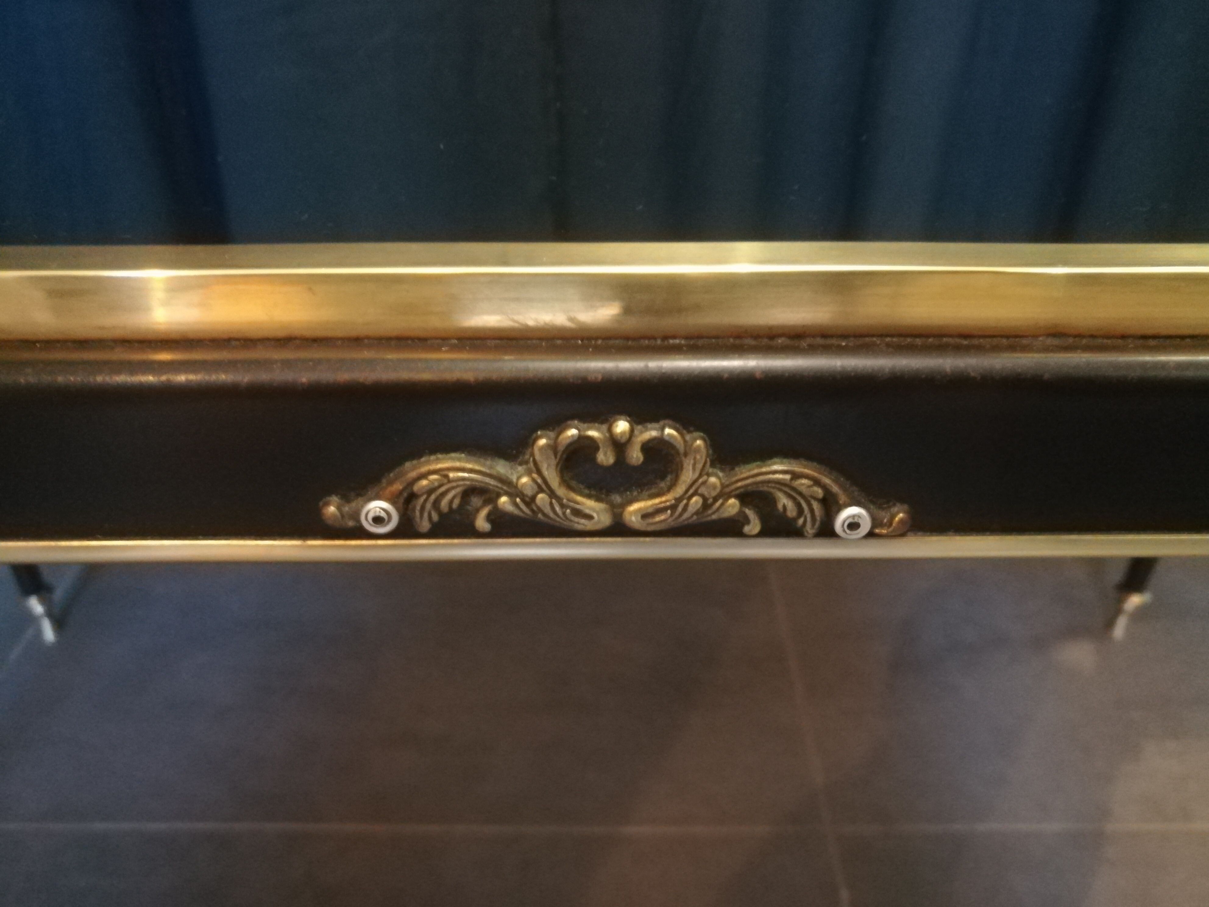 Coffee table in brass and black lacquered metal