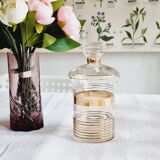 Blown glass decanter with golden borders