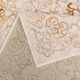 Vintage cream and brown Persian-style carpet in wool.