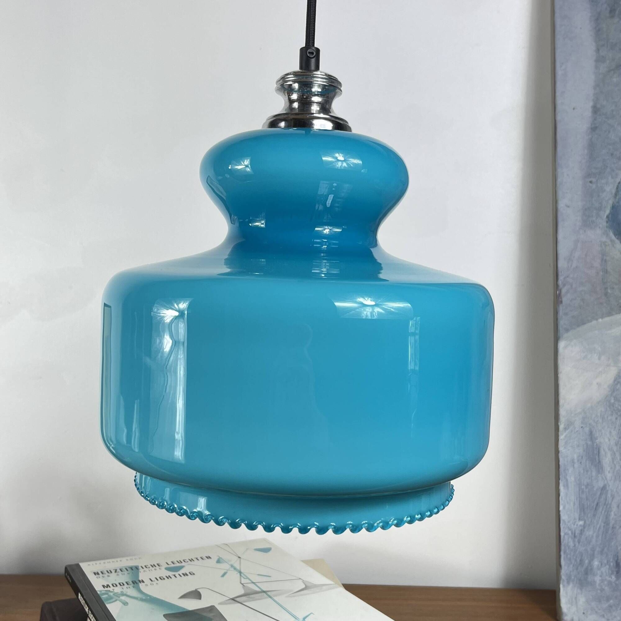 Suspension lustre globe in blue opaline glass from the 1970s.