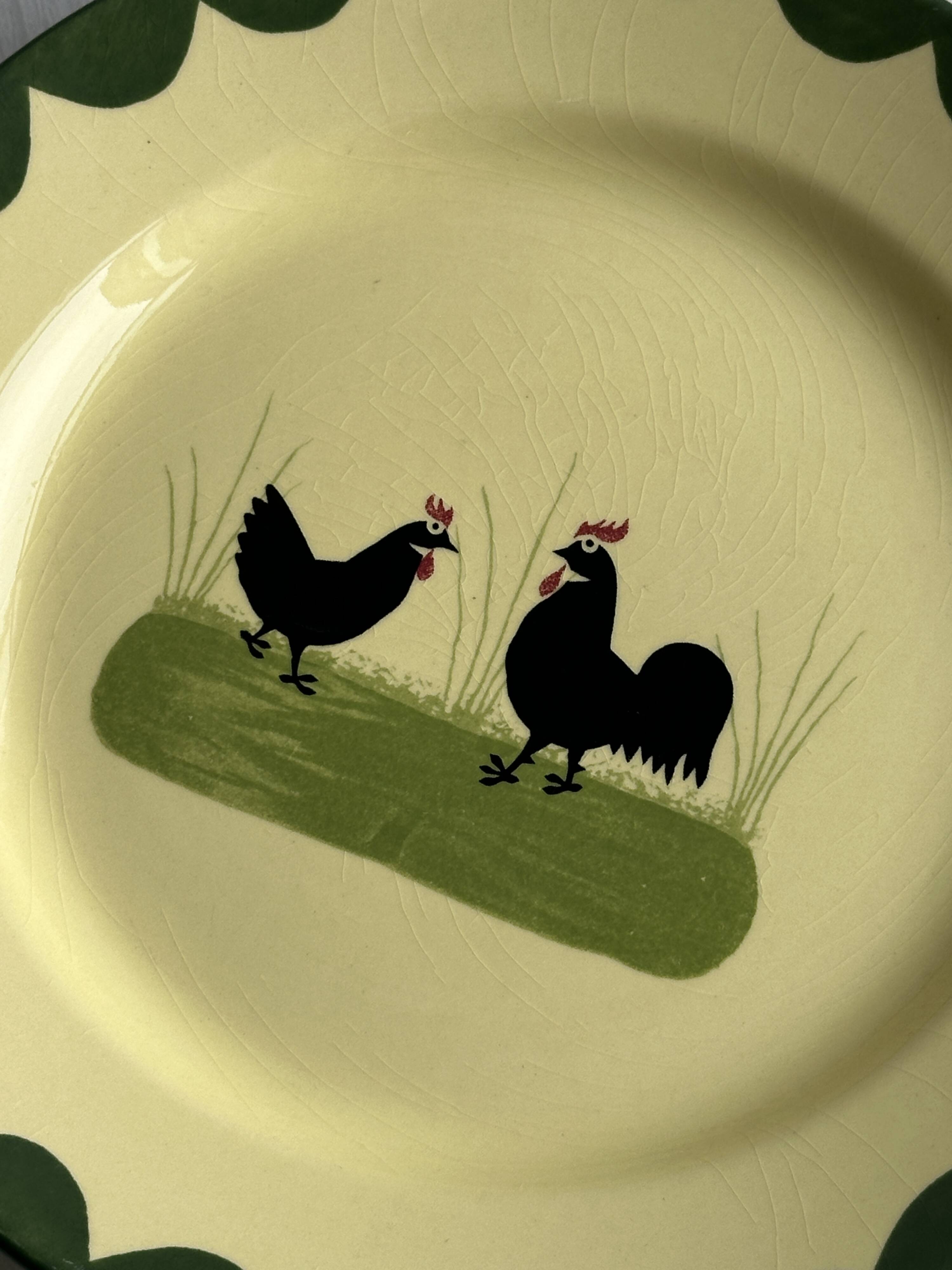 “Teller Keramik” ceramic plate with rooster motif.