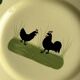 “Teller Keramik” ceramic plate with rooster motif.