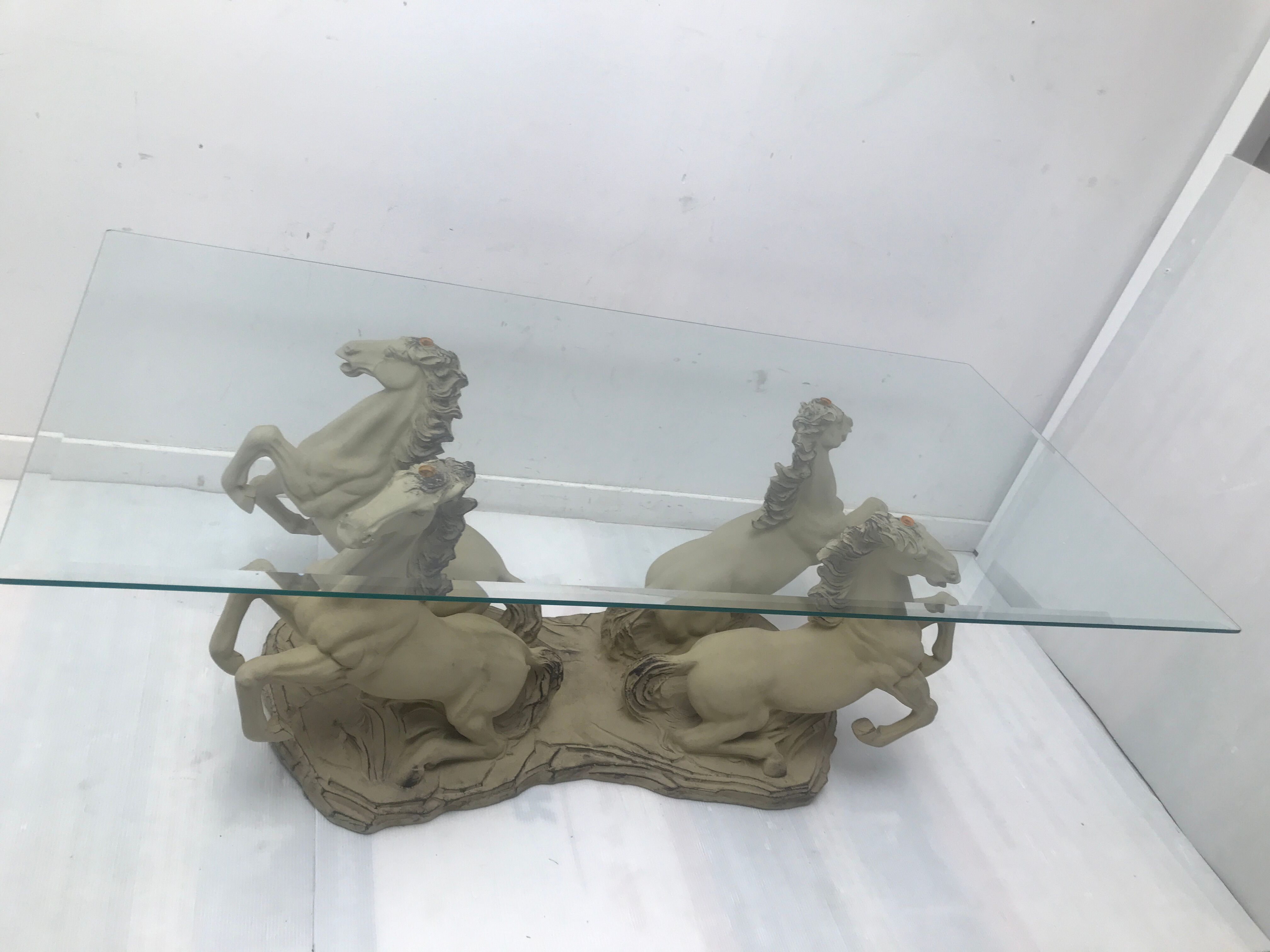 Coffee table glass top on 4 vintage horses