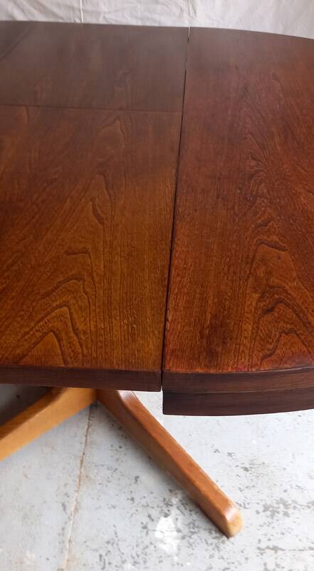 Vintage round extendable wooden table.