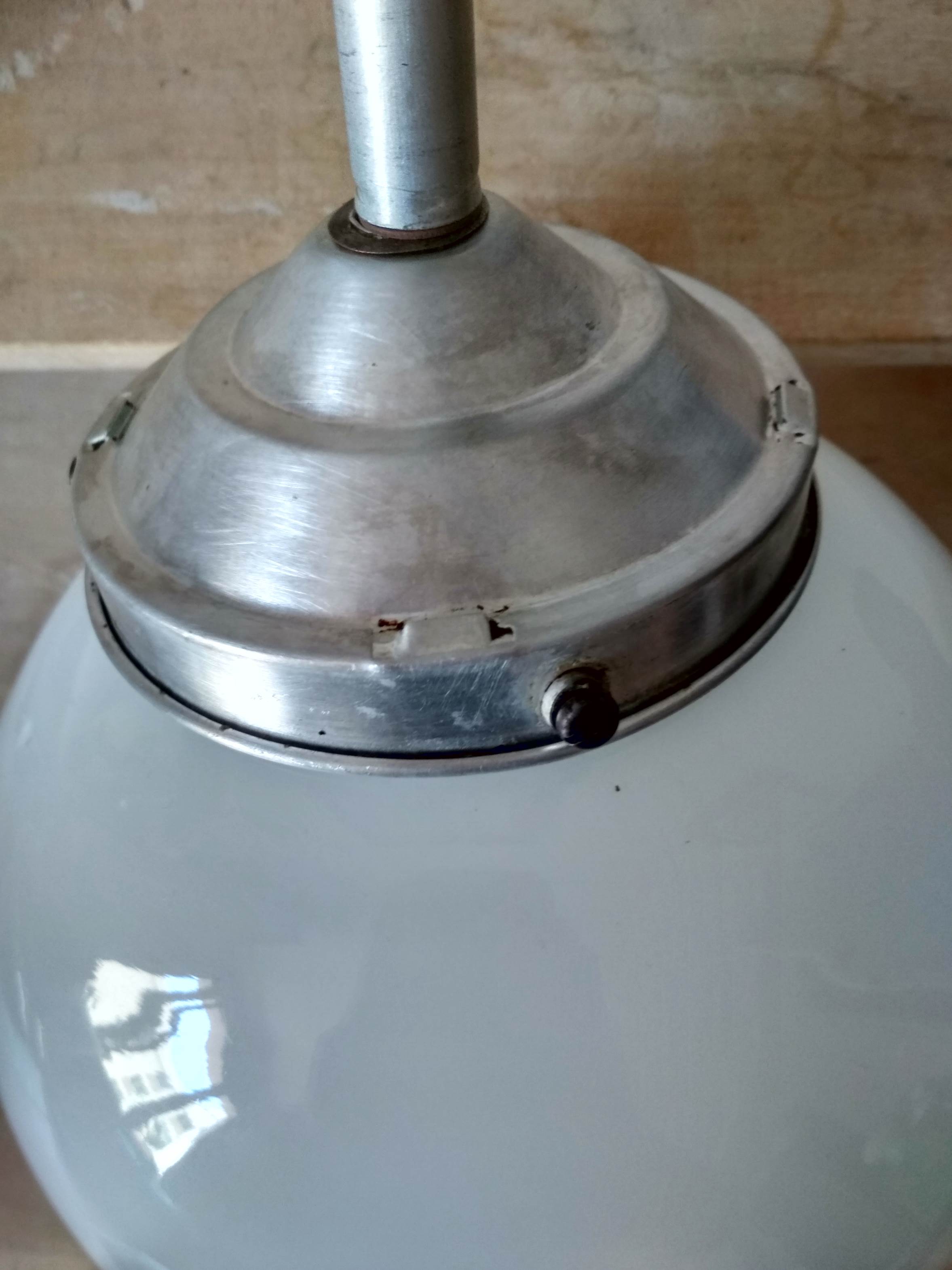 White opaline globe suspension on stem and aluminum metal structure