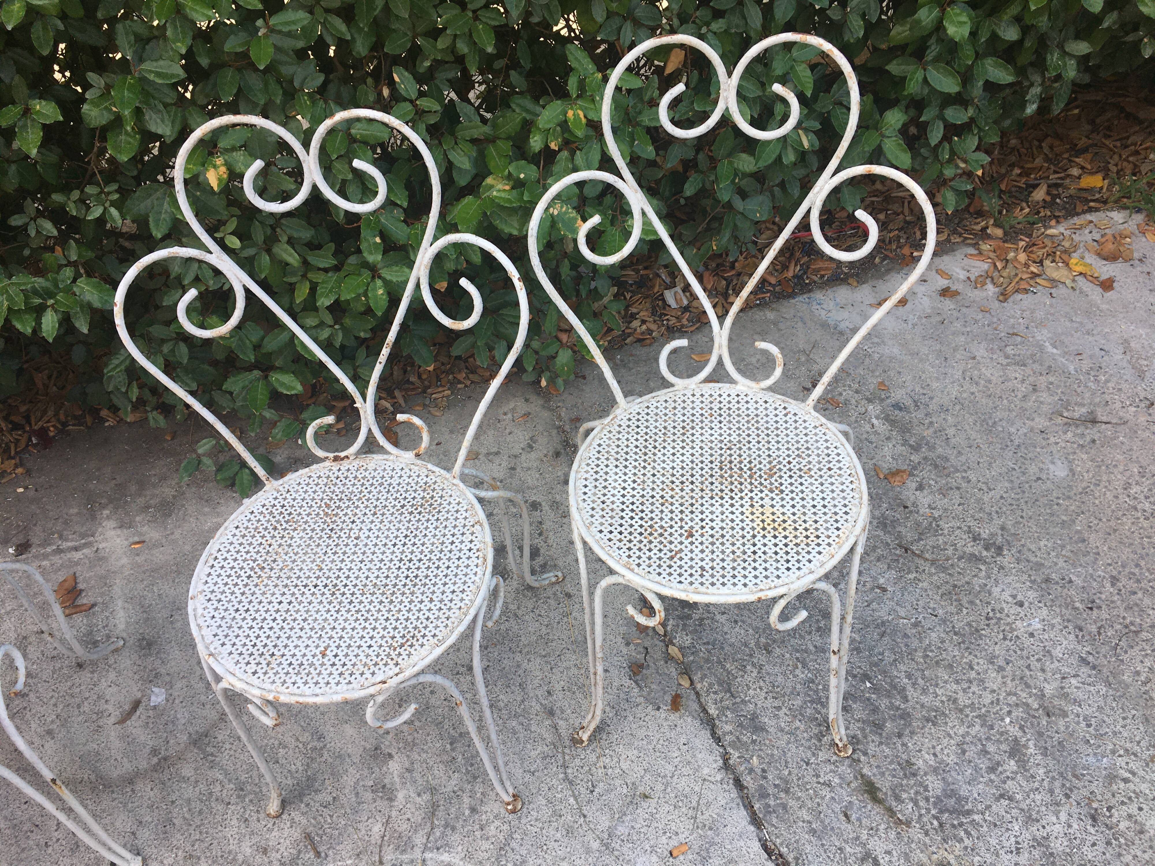 Set of 4 wrought iron chairs