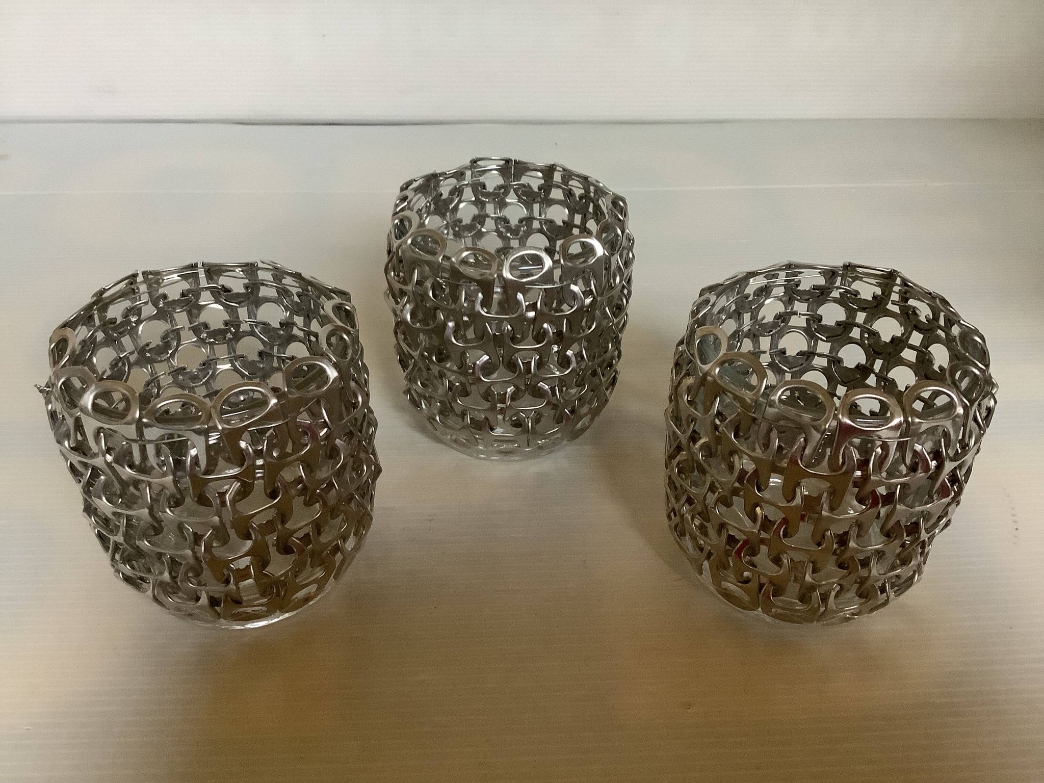 Trio of candle holders in metal strips folk art