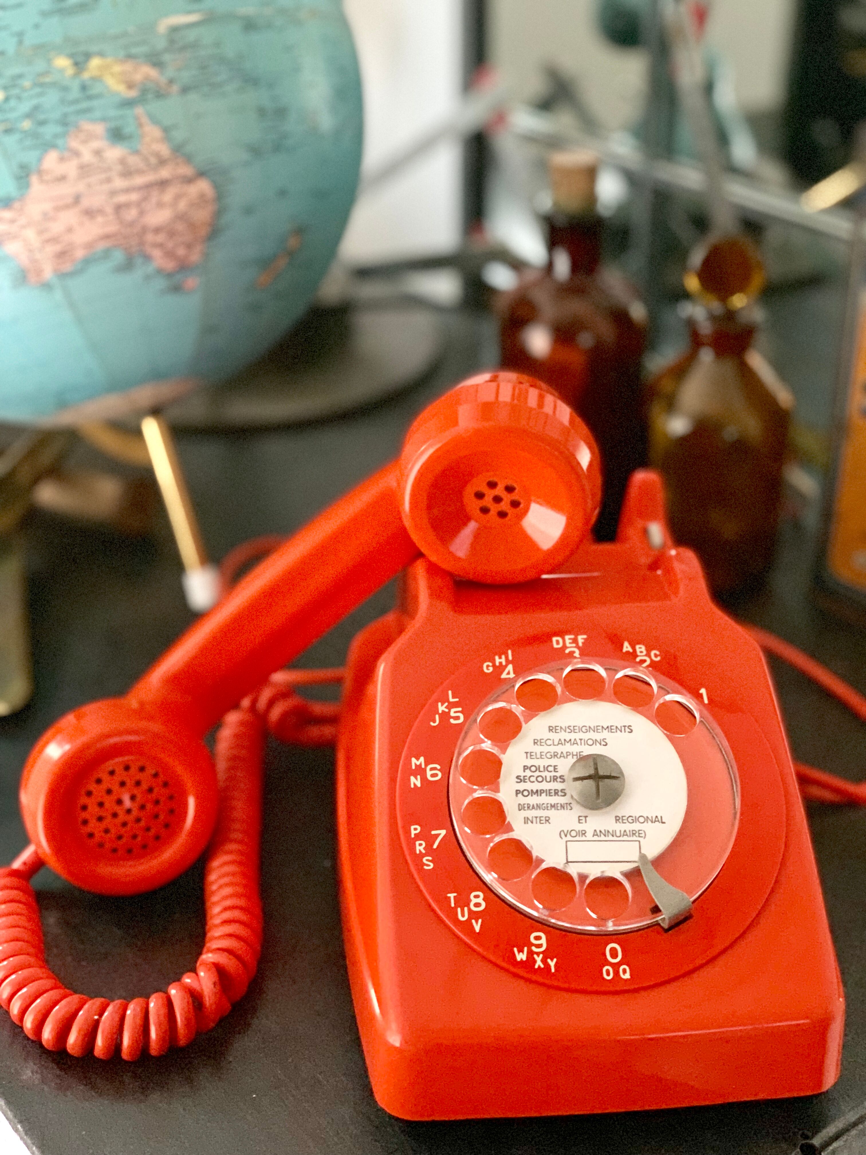 Old orange vintage dial phone