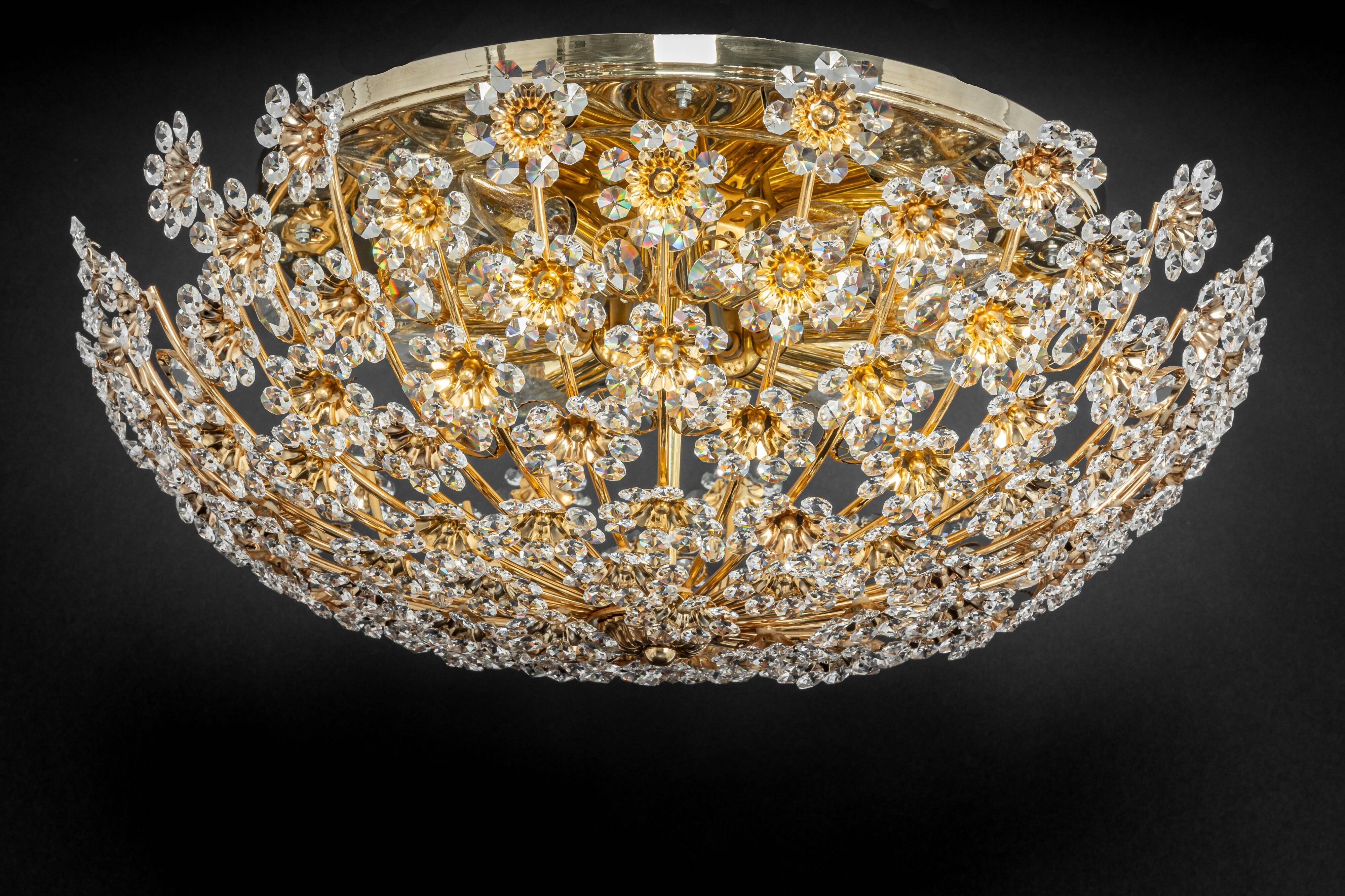 Small delicate ceiling light in gilded brass and cut glass in the shape of flowers by Palwa, Germany, 1970s.