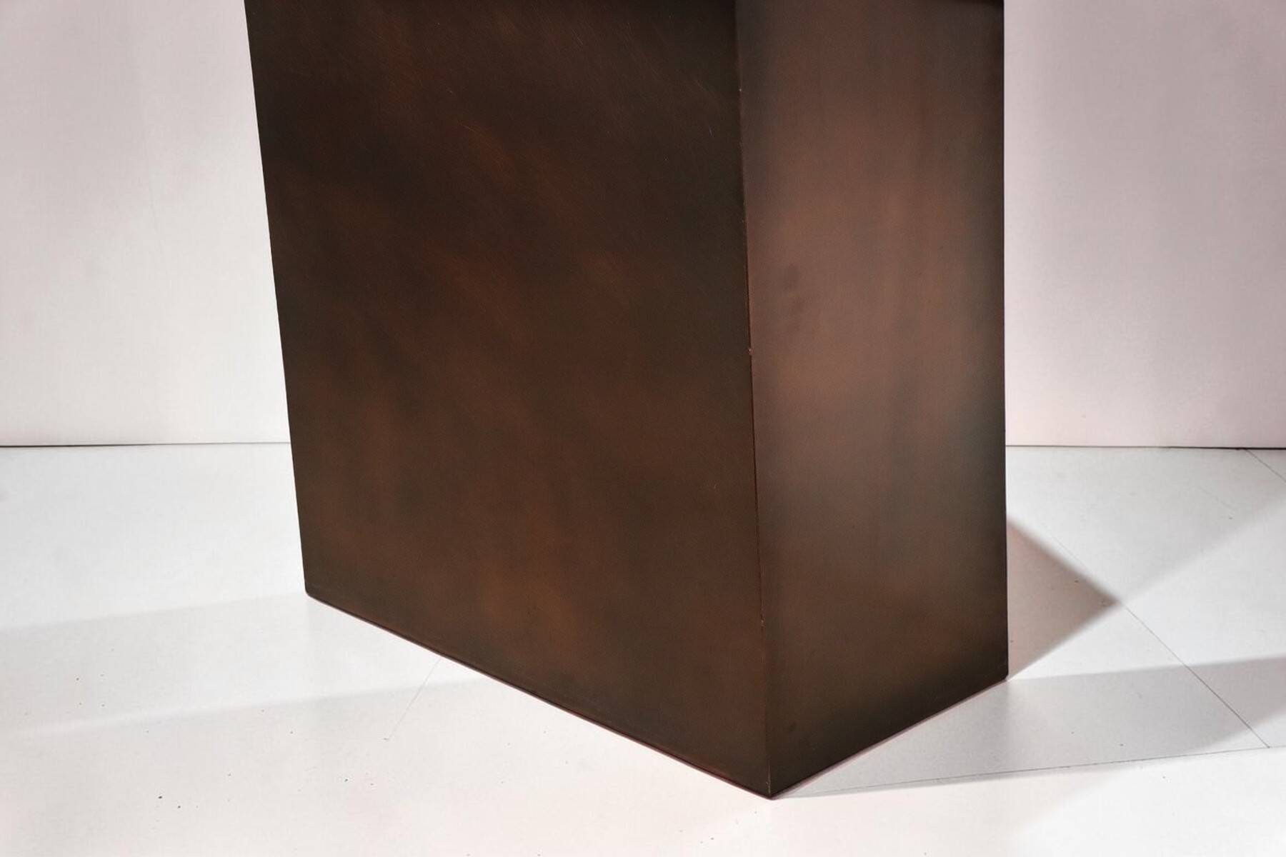 Minimalist console in travertine and patinated metal — 1970s
