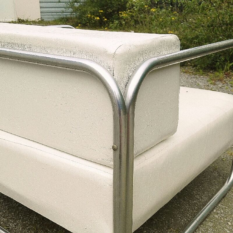 Chrome-designed chair and faux white leather 1970