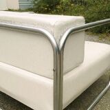 Chrome-designed chair and faux white leather 1970