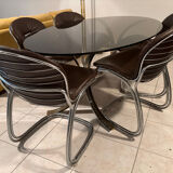 Table and chairs in the style of Gastone Rinaldi.