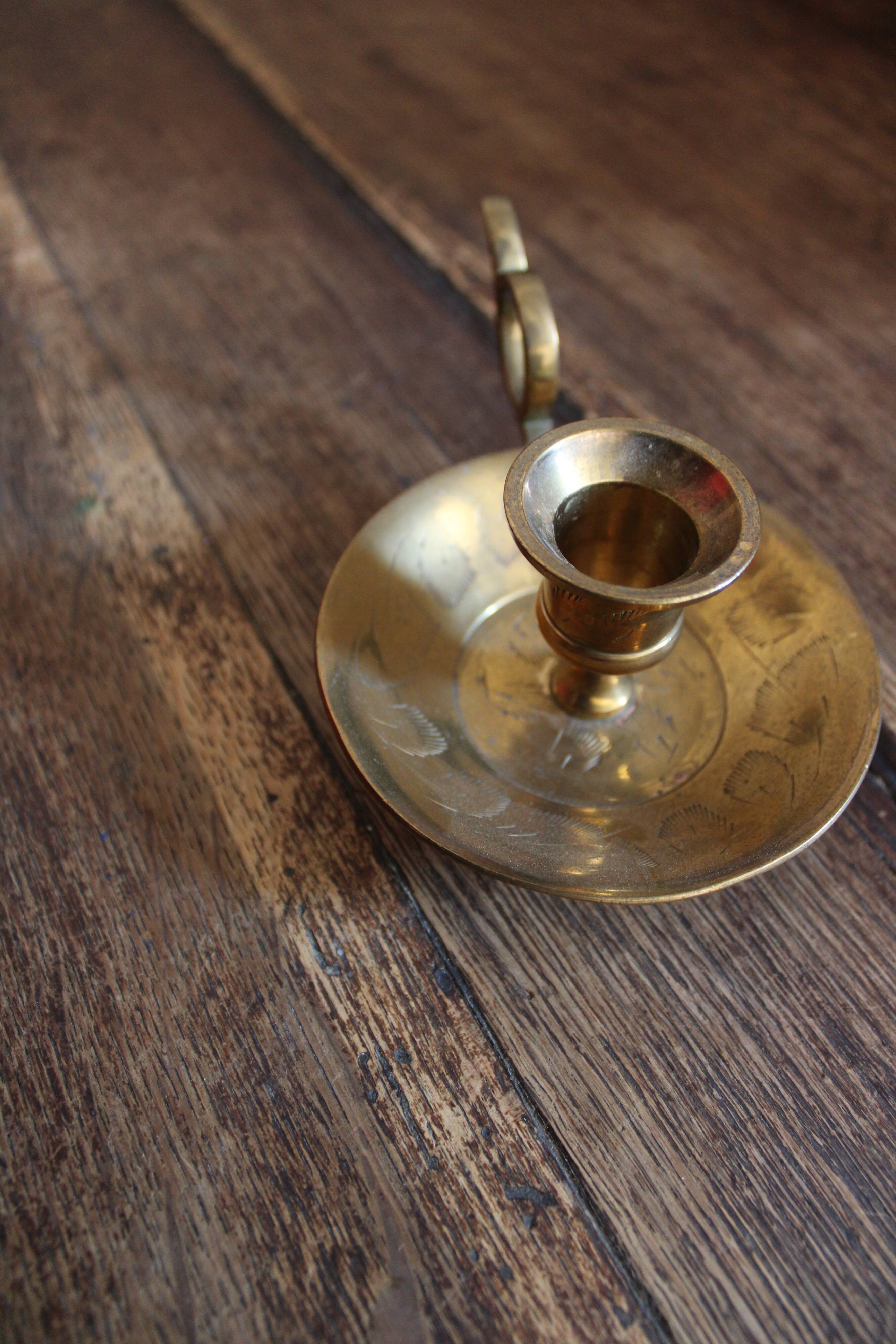 Brass cellar rat candlestick
