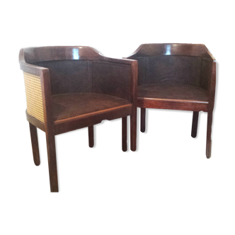 Pairs of convertible armchairs in wood and canework