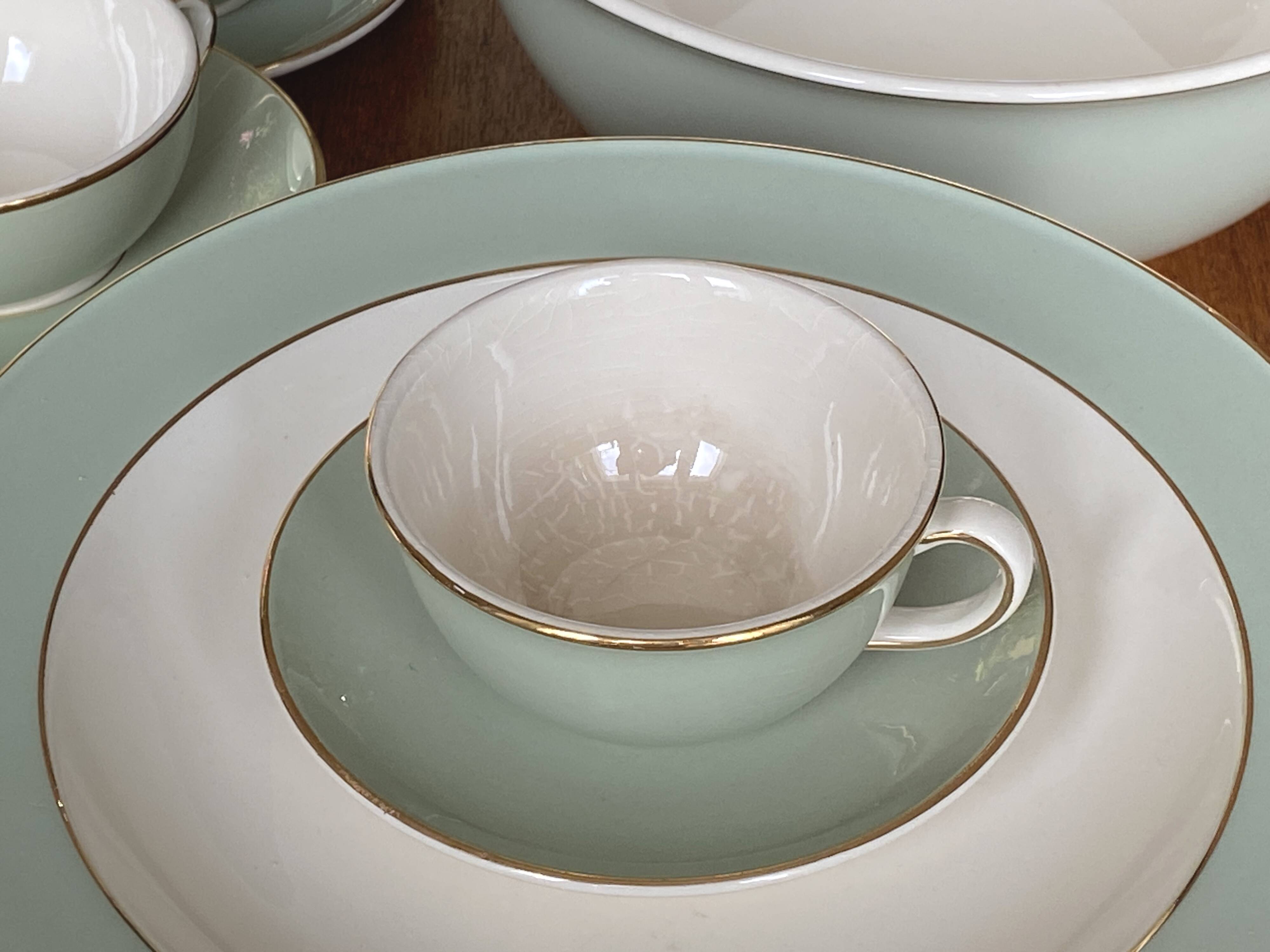 Villeroy & Boch table service in celadon green and ivory, 102 pieces.