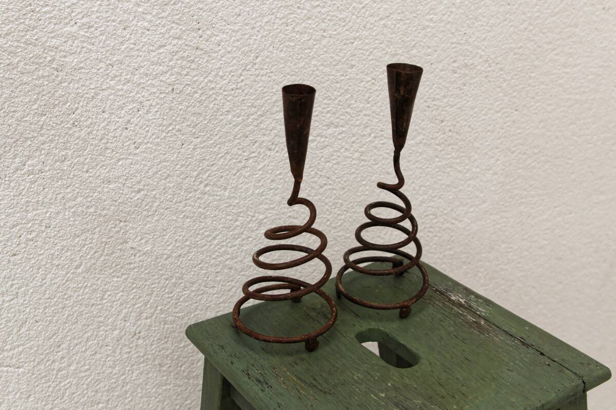 Pair of wrought iron spiral candlesticks