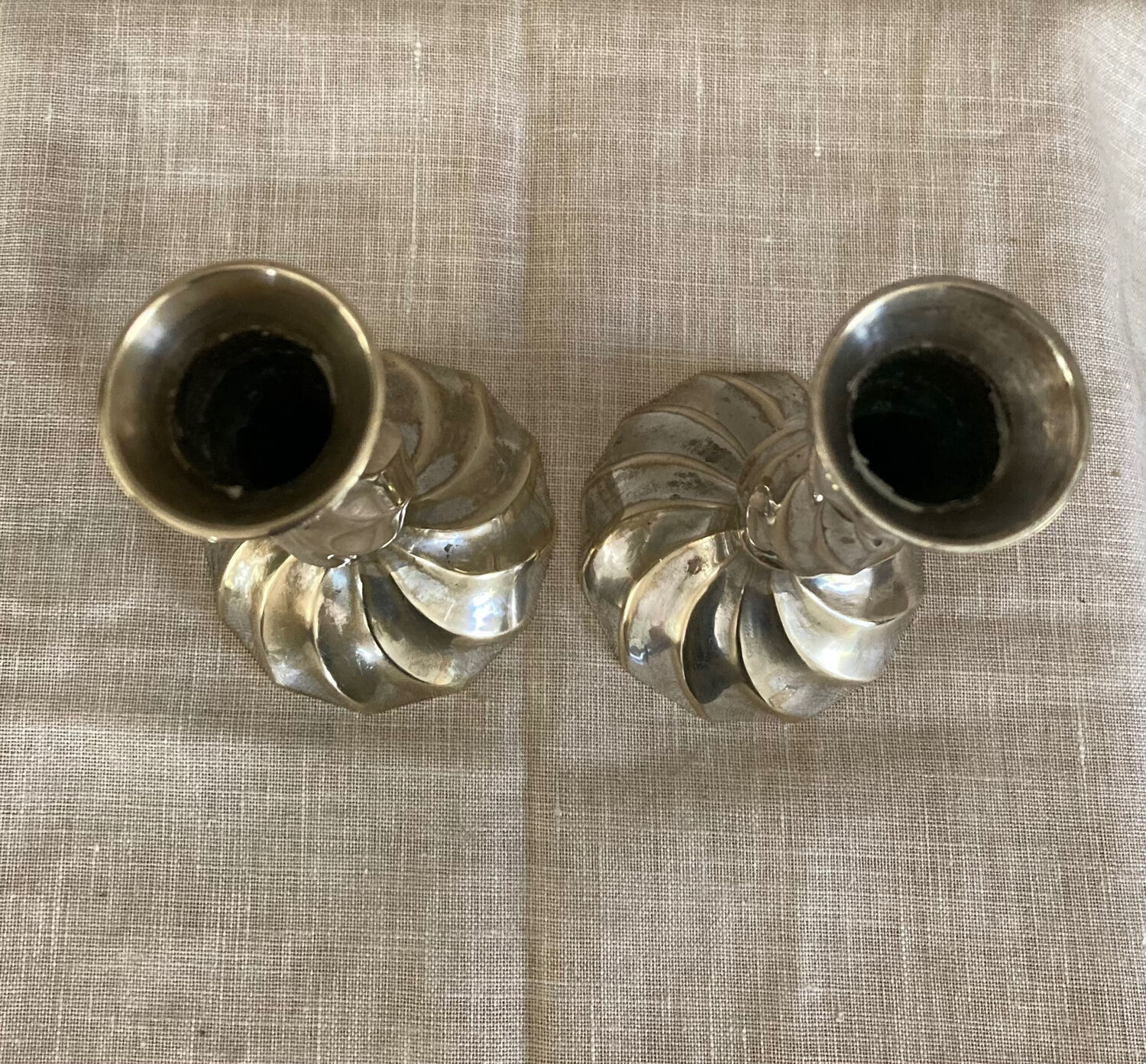 Twisted candlesticks in silver brass early twentieth century