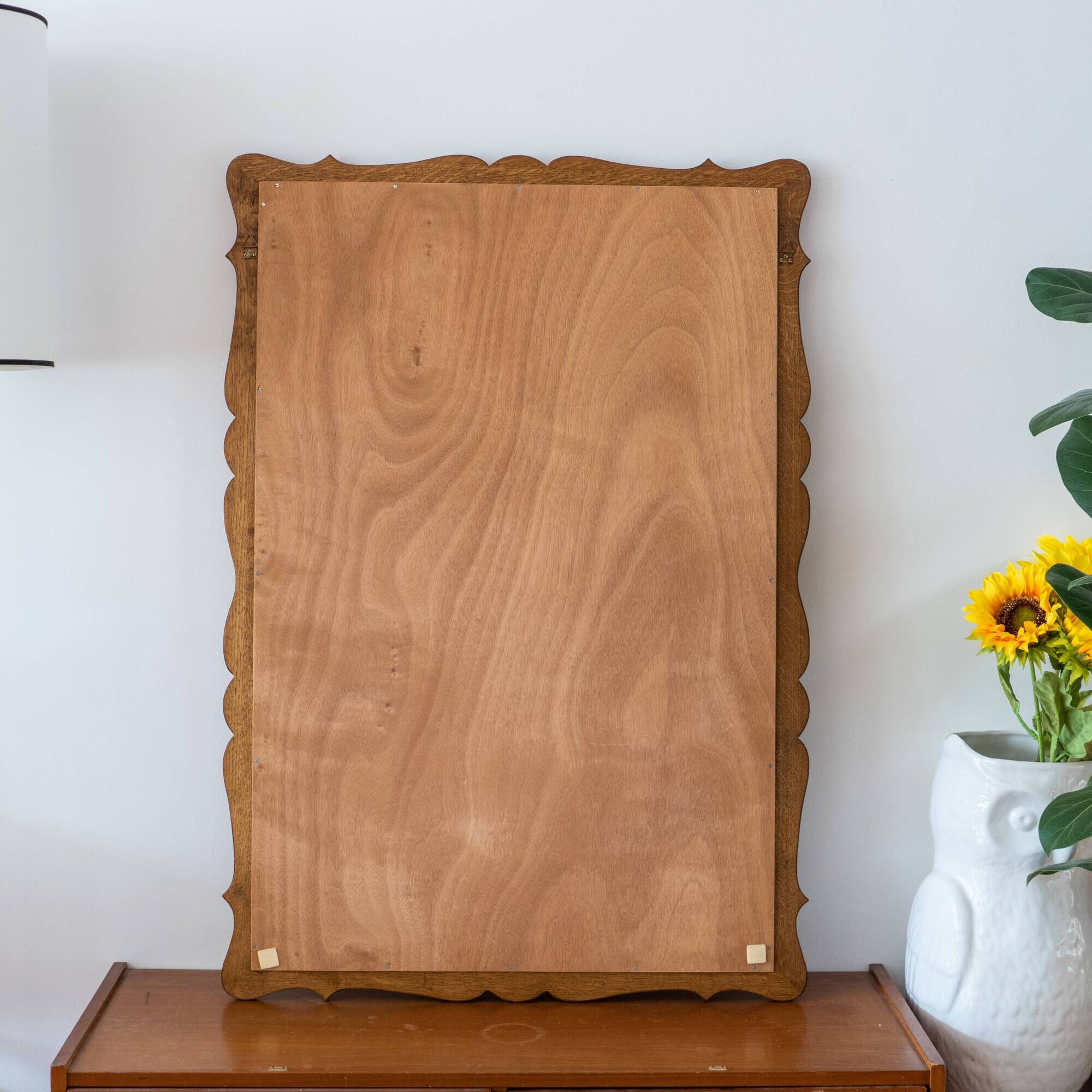 Very large vintage mirror in scrolled solid oak
