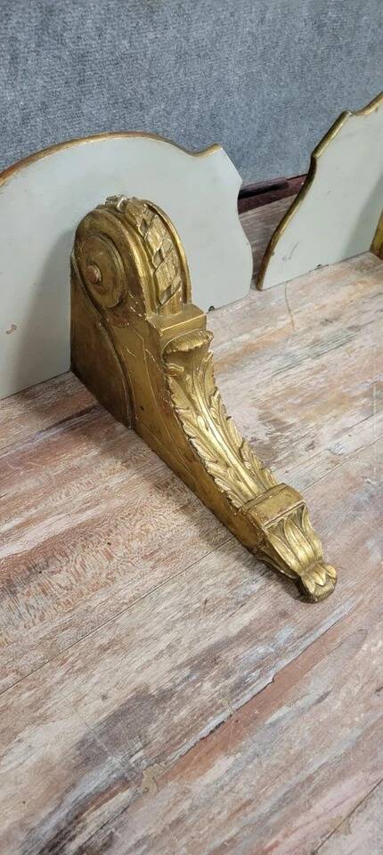 Pair of Louis XV style wall consoles in gilded wood