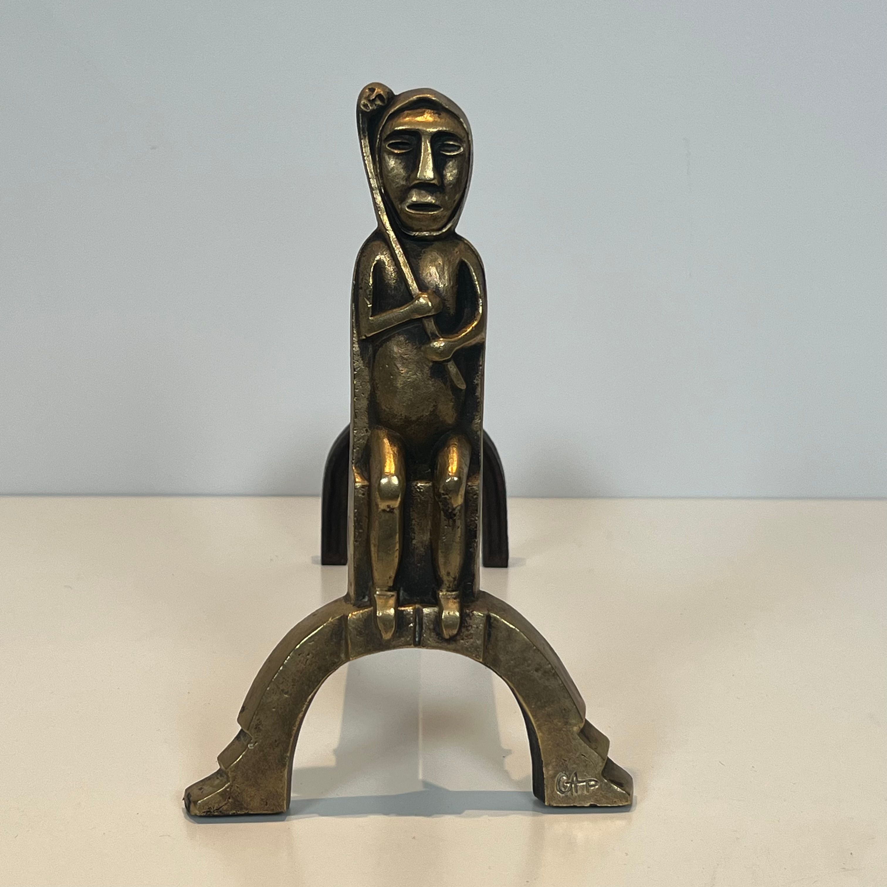 Pair of bronze andirons with seated shamans monogrammed Anton Prinner