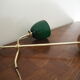 Desk lamp in brass with a swan neck and green opaline glass.