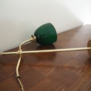 Desk lamp in brass with a swan neck and green opaline glass.