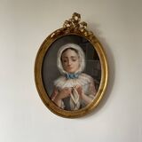 Portrait of a young girl in pastel from the 19th century.