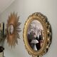 Golden oval mirror 70s