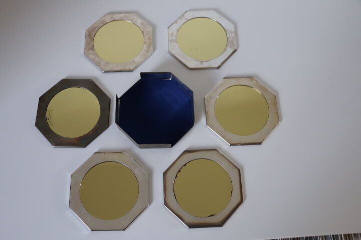 6 metal coasters and art deco mirror