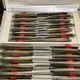 Set of 24 Bakelite stainless steel knives in box