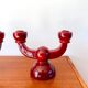 pair of burgundy enameled ceramic candlesticks / candelabras signed 1949