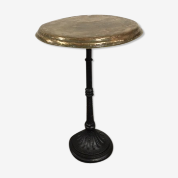 Old foot cast-iron bistro and brass round tray