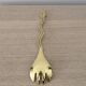 Gold metal snake salad serving set