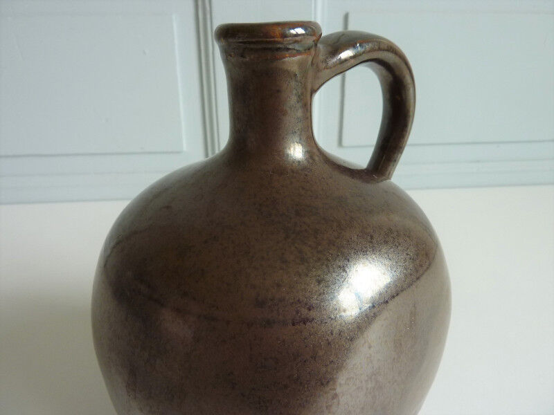 Verified sandstone water jug