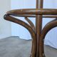 Vintage bentwood coat rack in Thonet style / Dark wood coat rack with shadow.