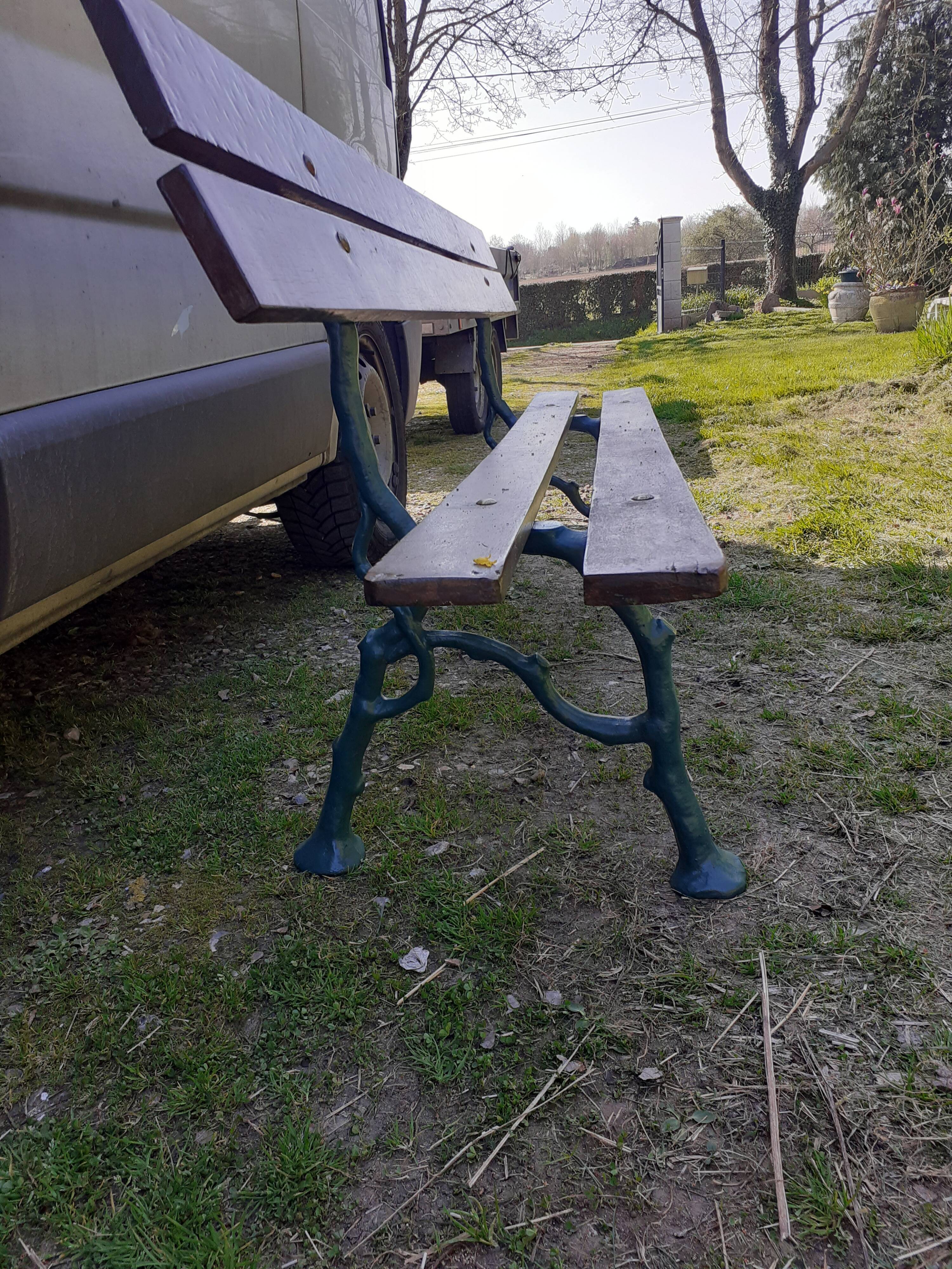 Old garden bench with cast iron feet