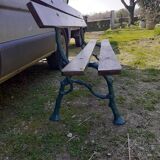 Old garden bench with cast iron feet