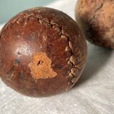Two old nineteenth century leather golf balls
