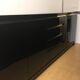 Wide row black lacquer and brass