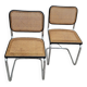 Pair of chairs by Marcel Breuer in black canework model B32 signed Italy