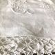 Old embroidered cloth, monograms and lace